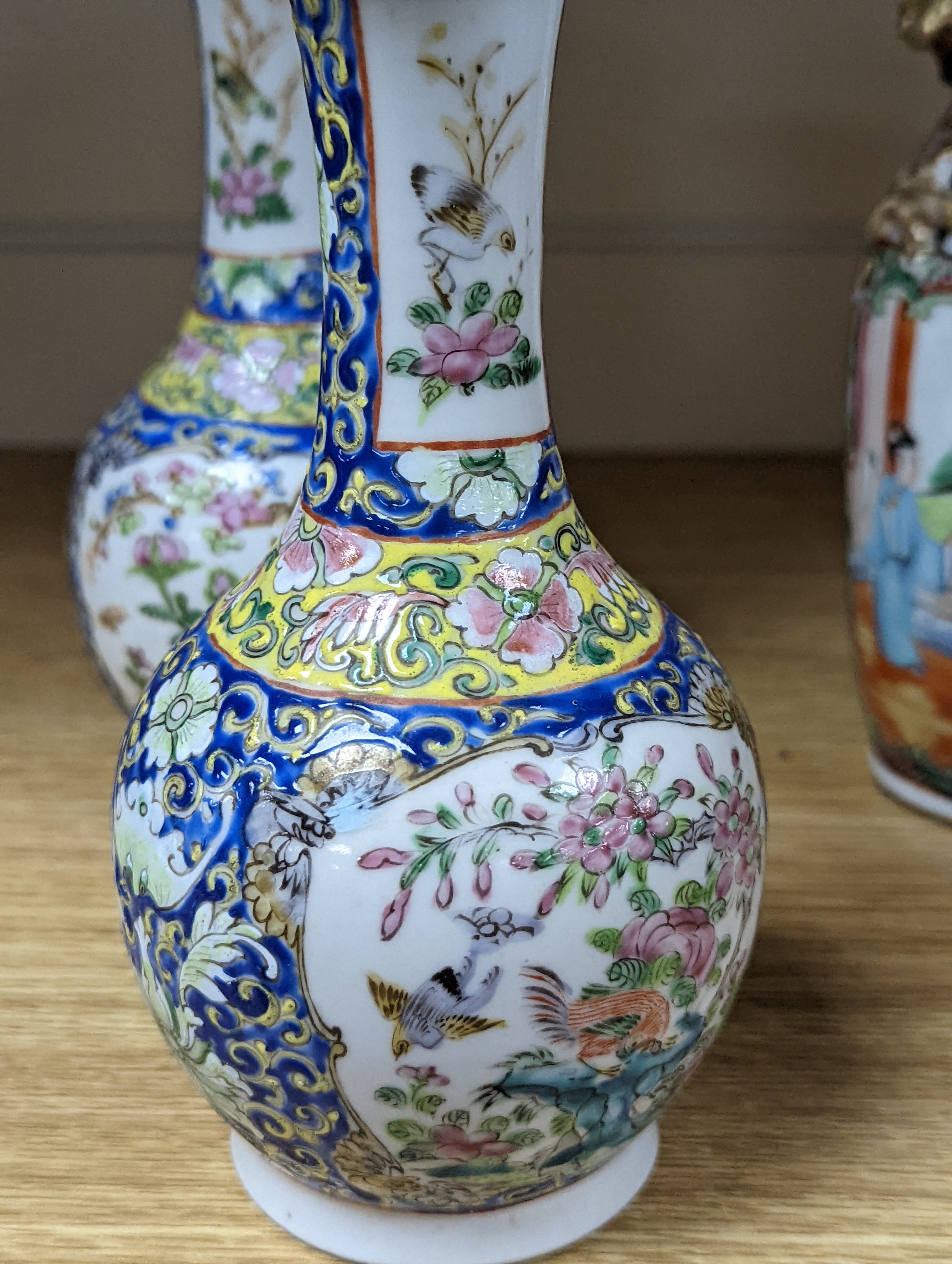 Four 19th century Chinese famille rose vases, 21cm